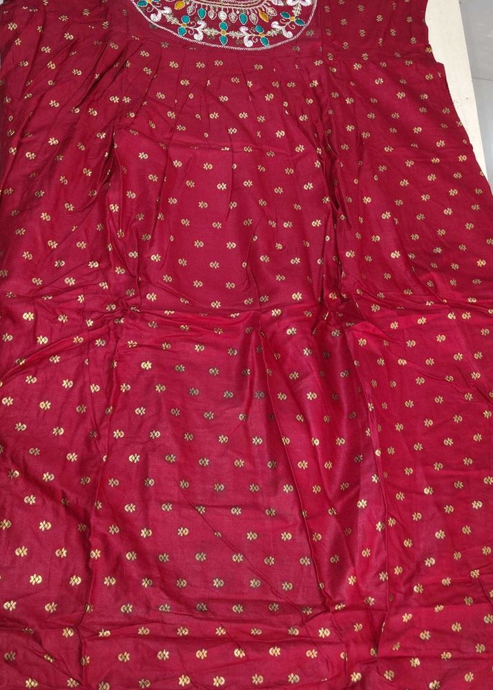 Elegant Maroon Kurta with Golden Motifs