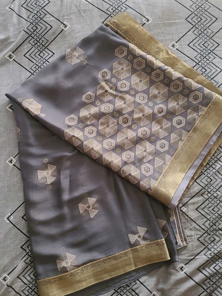 Elegant Grey Saree with Gold Border