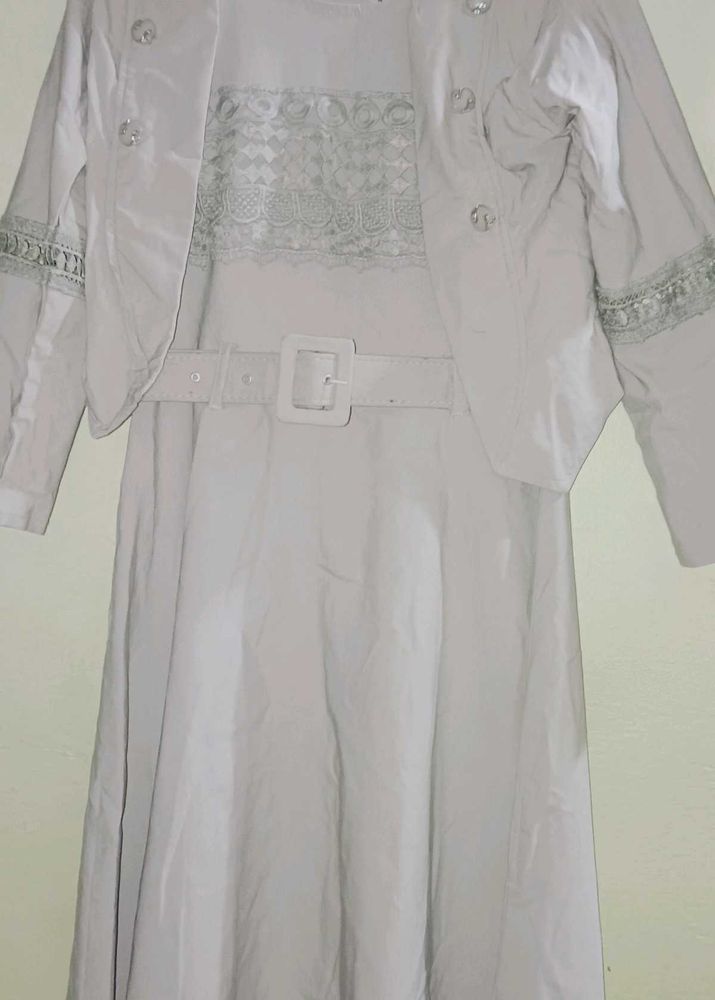 Elegant tunic with jacket and belt