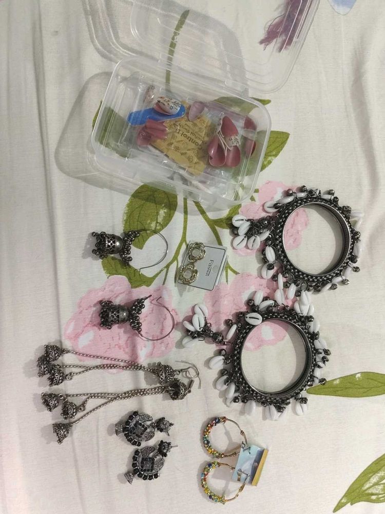 Bangles ear rings Nail extensions