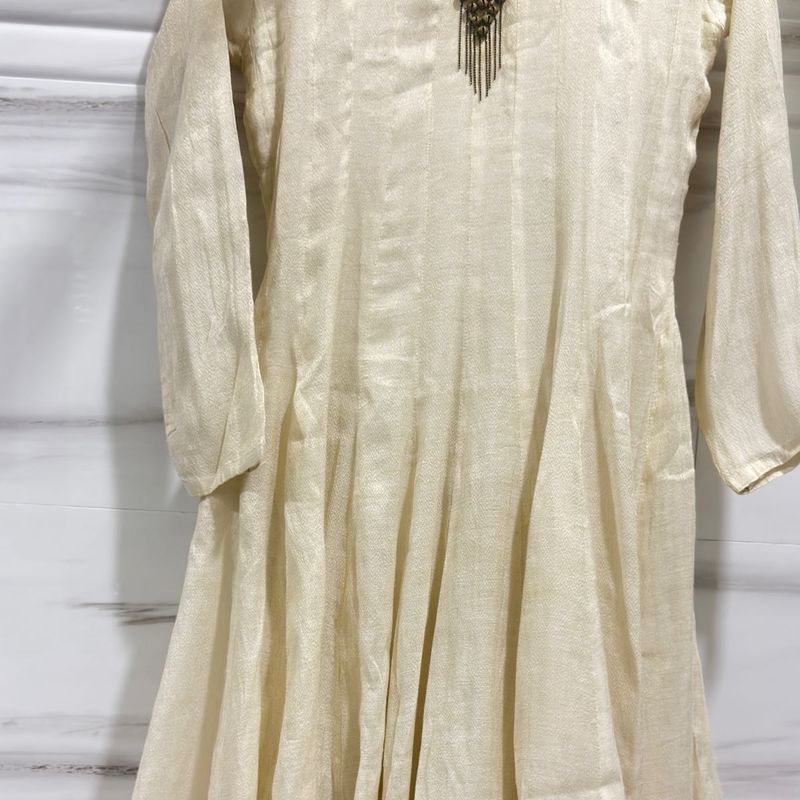 Elegant Cream Kurta Set with Embellished Neckline