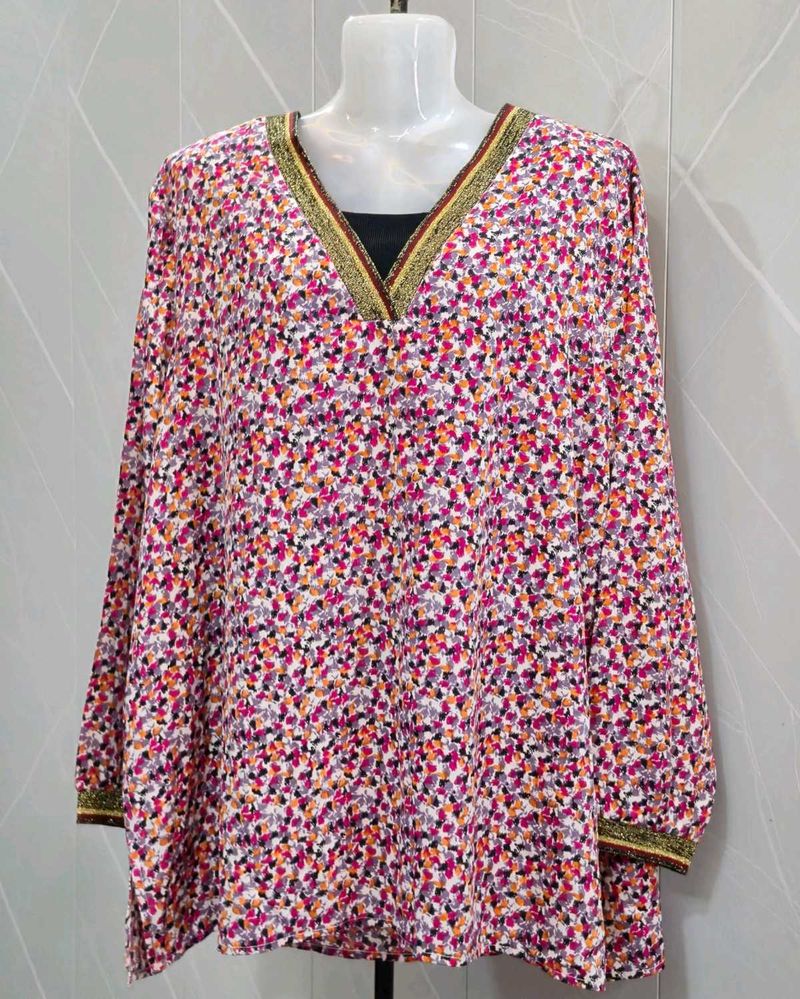 Chic Floral Print Top with Embellished Neckline