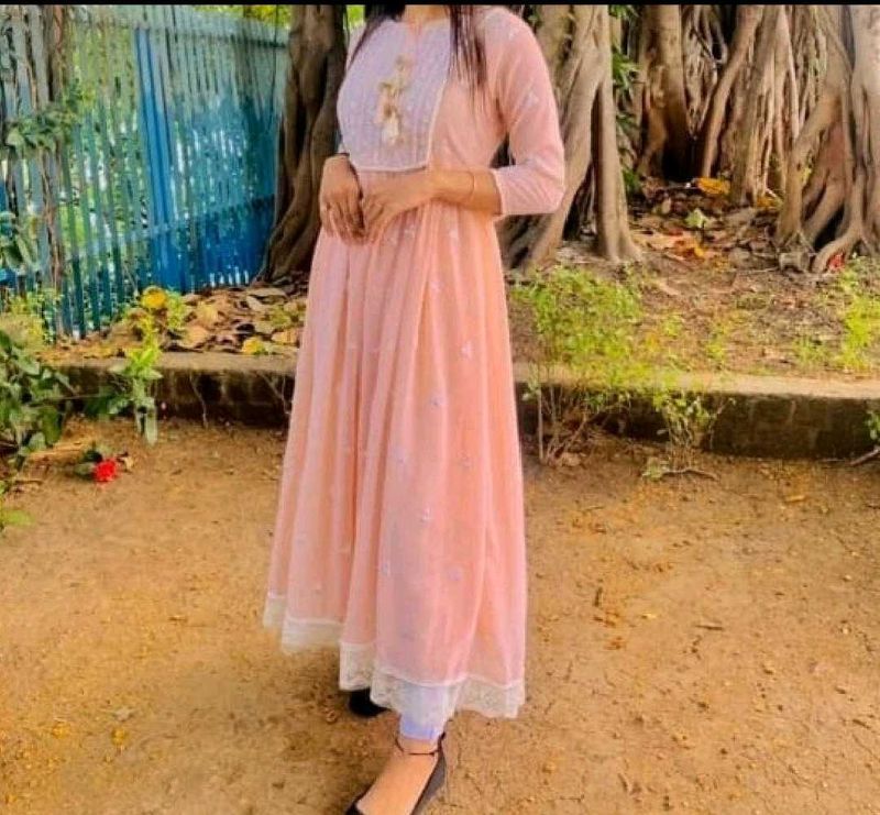 Elegant Peach Kurta with Intricate Embroidery