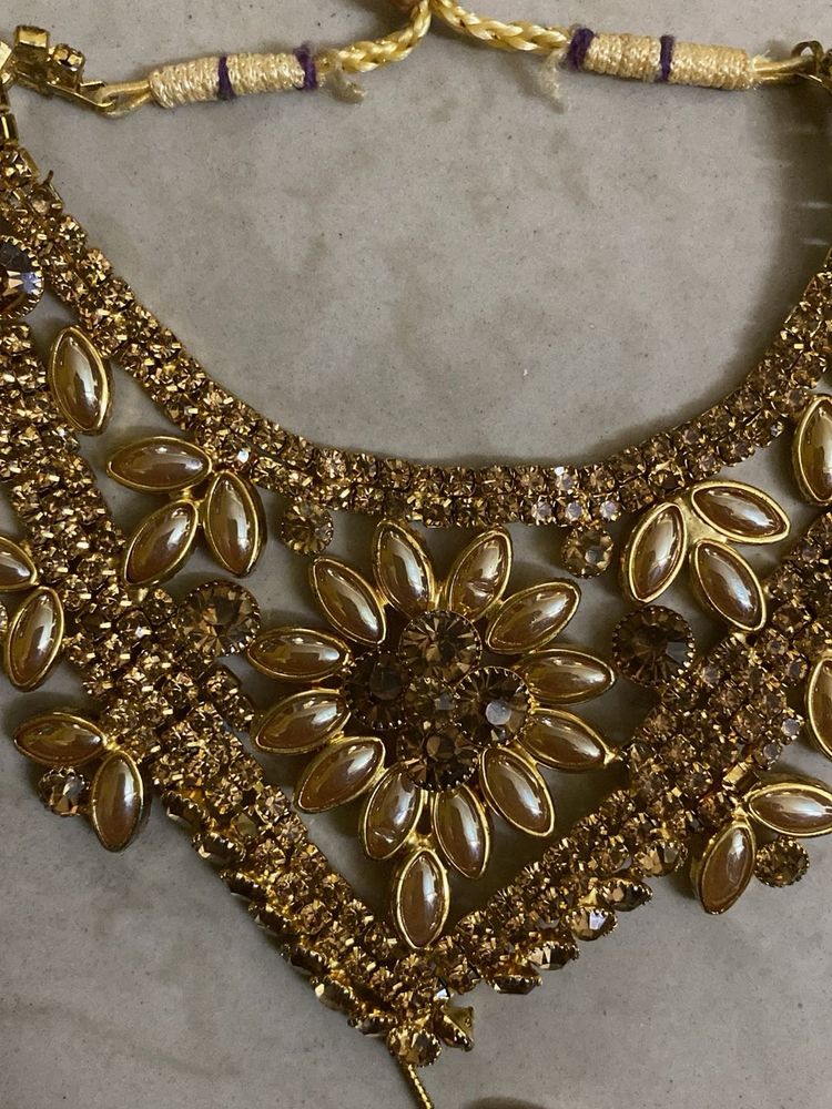 Golden Necklace Set with earings and mangtika