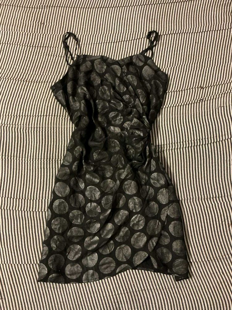 Sleek Black Polka Dot Mini Dress