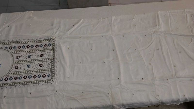 Elegant White Kurta with Intricate Embroidery