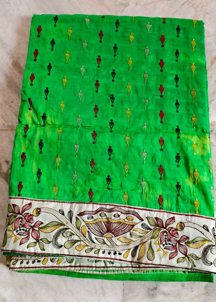 Vibrant Green Saree with Folk Motifs