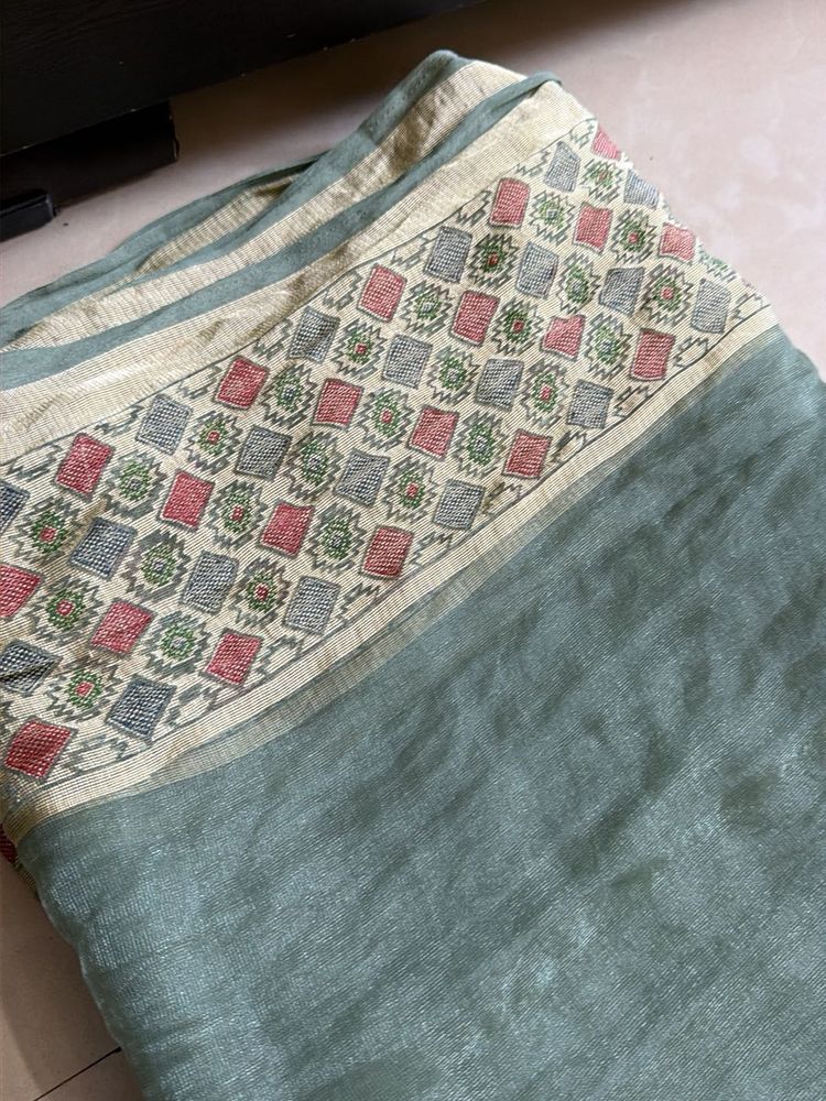 Elegant Green Saree with Geometric Border
