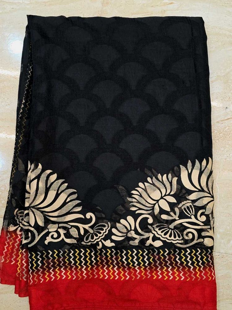 Elegant Black Saree with Floral Border