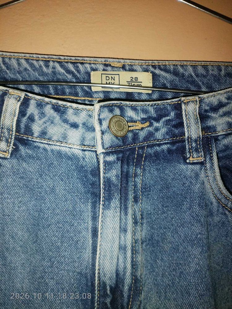 Distressed Blue Denim Jeans