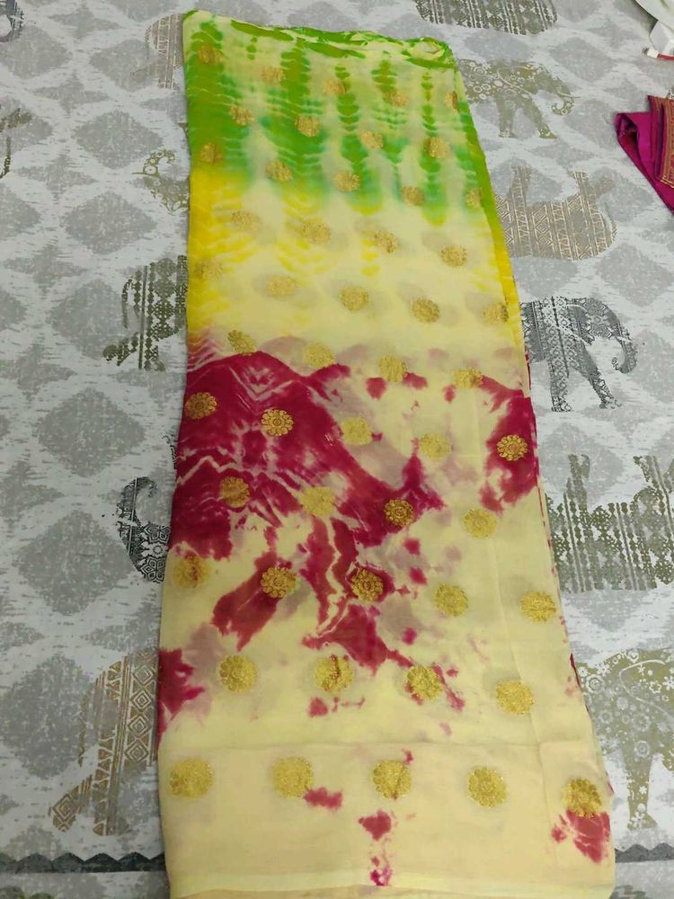 Vibrant Tie-Dye Saree with Gold Accents❤️💛💚🤍