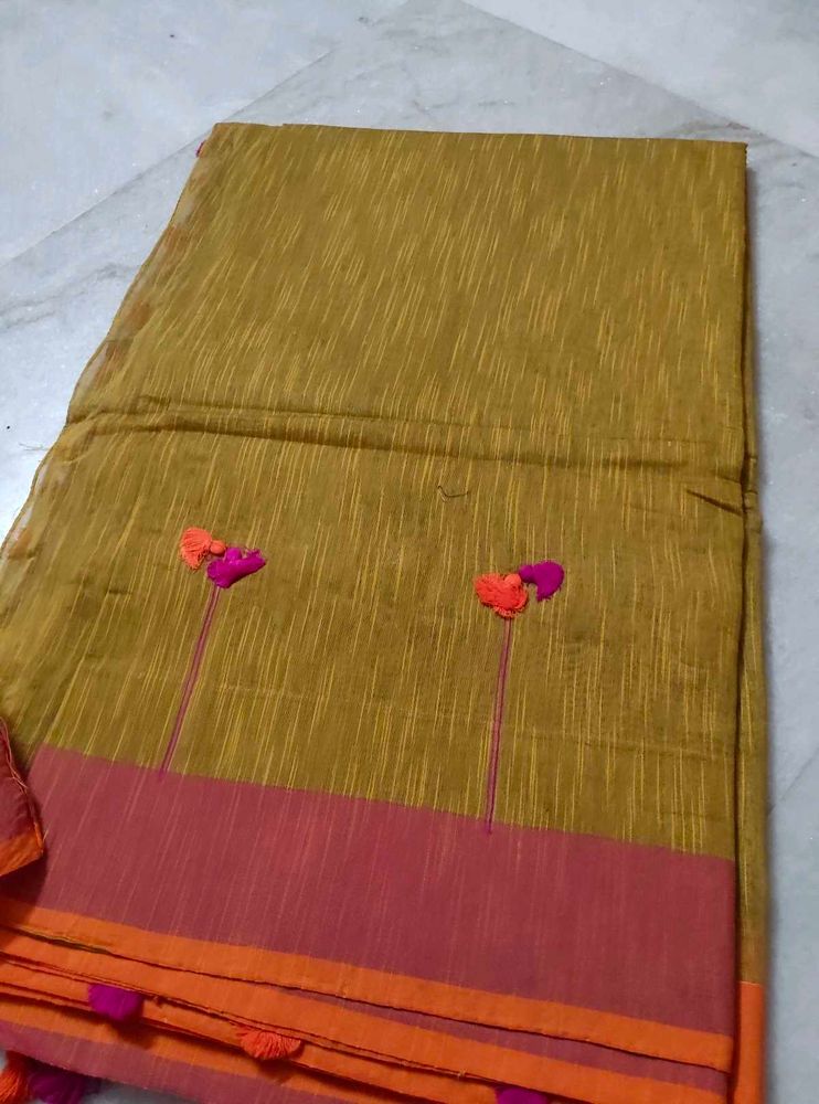 Mustard Yellow linen Saree with Tassels