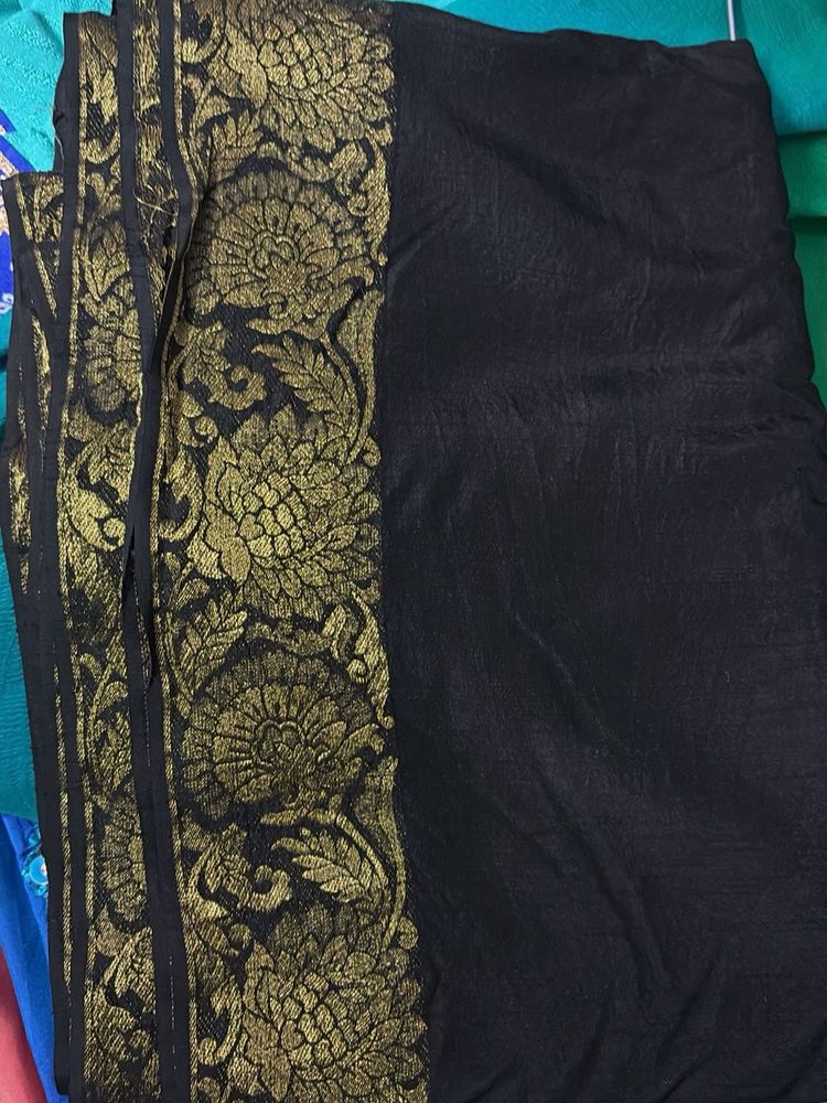 Elegant Black Saree with Gold Border