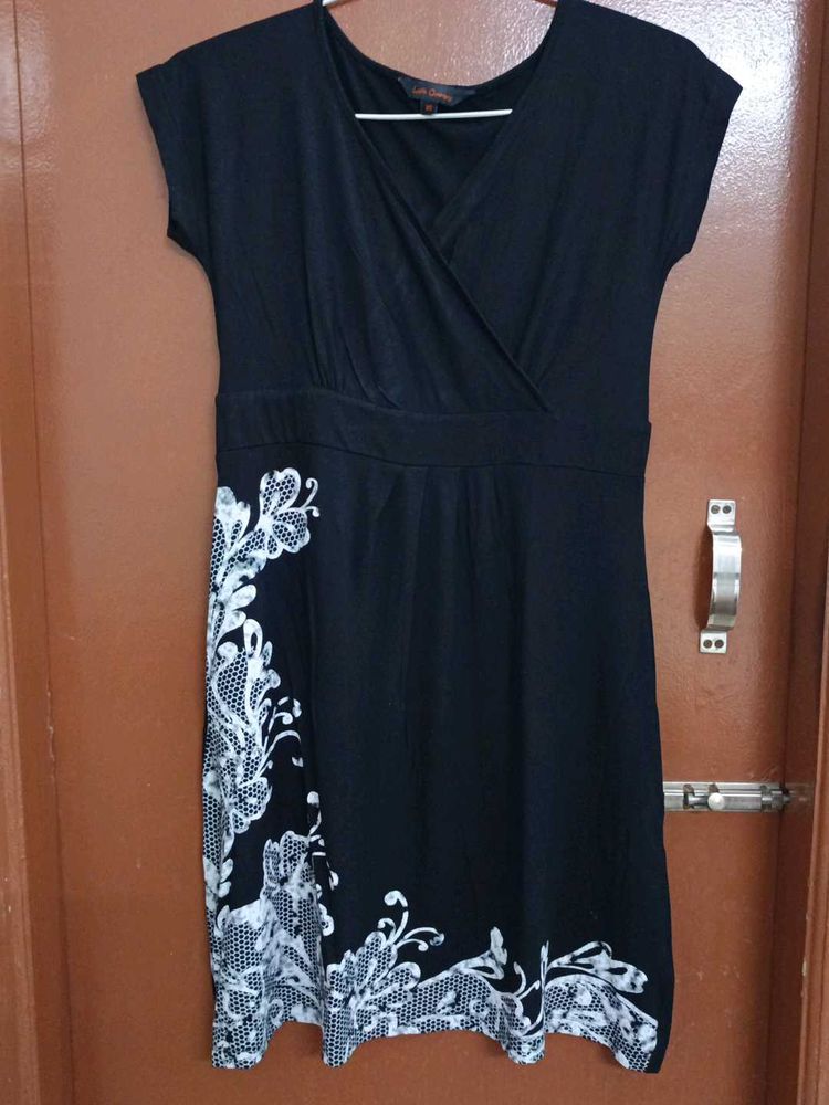 Chic Black Dress with White Lace Detail