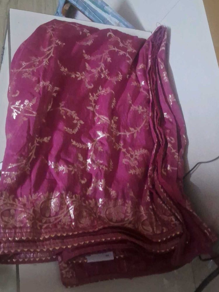 Elegant Pink Saree with Gold Motifs