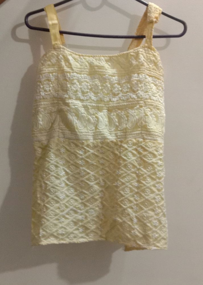 Sleeveless Peplum Top
