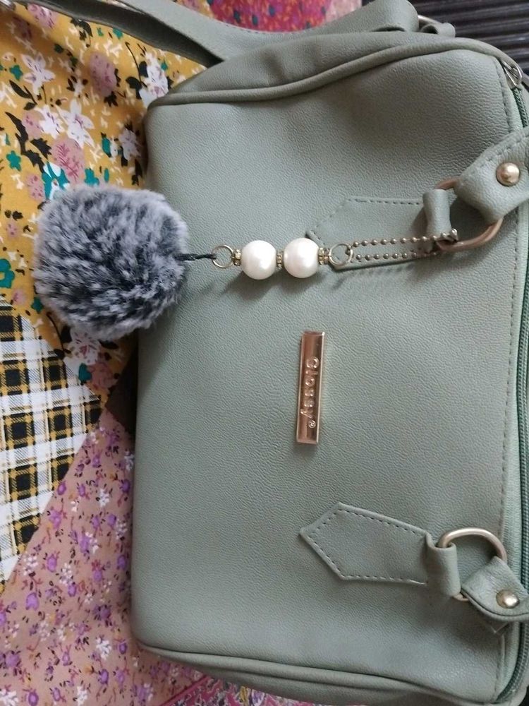 Stylish Light Green Handbag with Charm