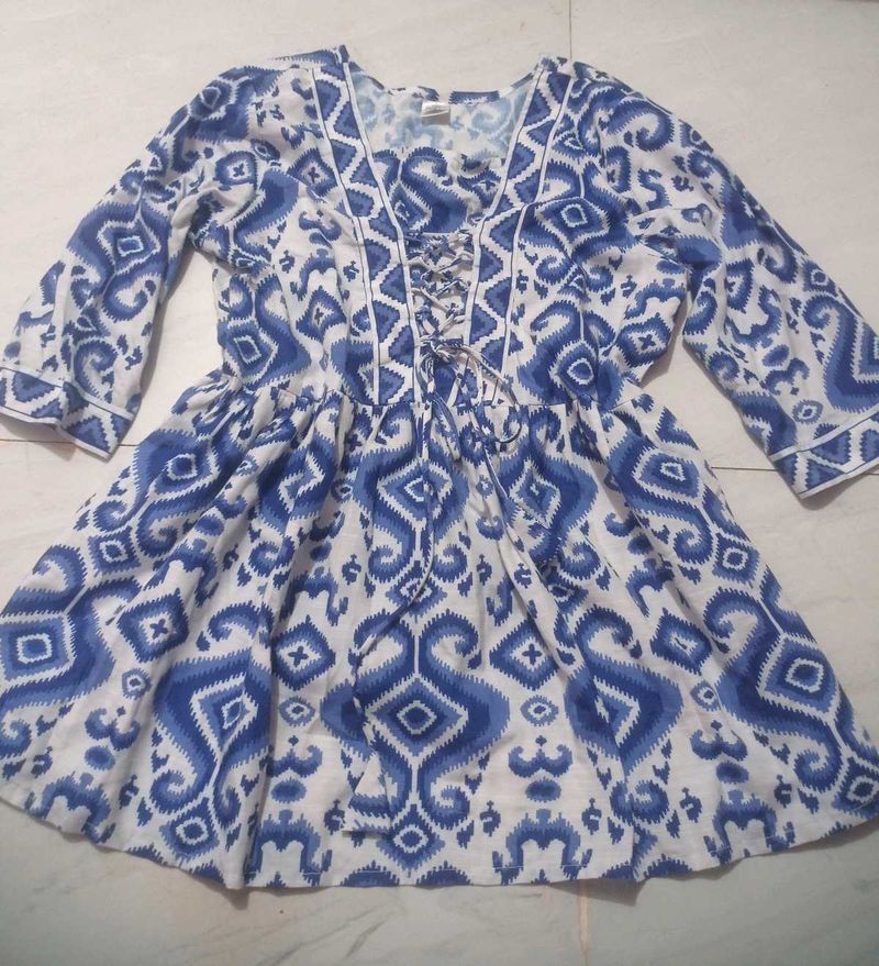 Blue Ikat Print Lace-Up Tunic Top