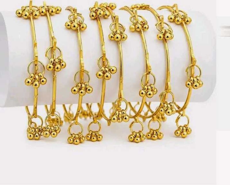 Elegant Gold-Plated Bangles with Tassels