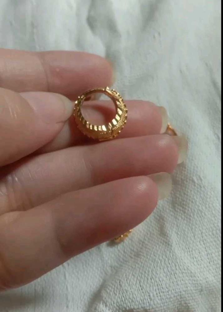 Elegant Gold-Tone Hoop Earrings per piece 150rs