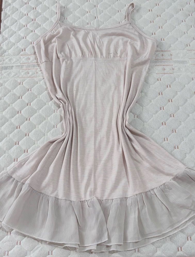 Chic Cream Slip Dress with Ruffle Hem