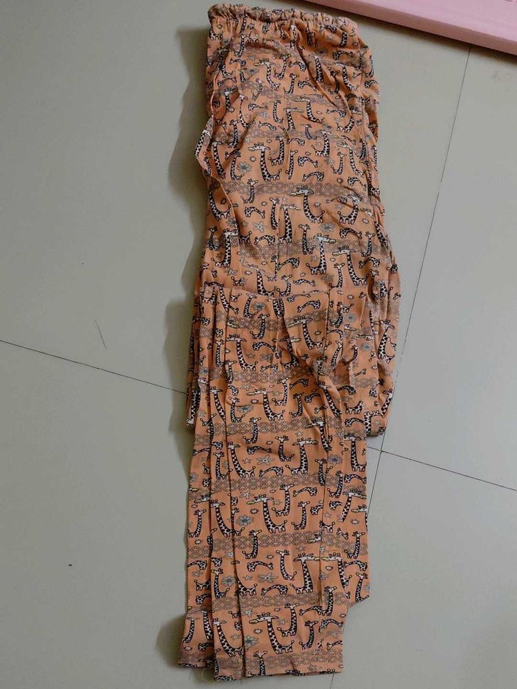 Orange Giraffe Print Palazzos