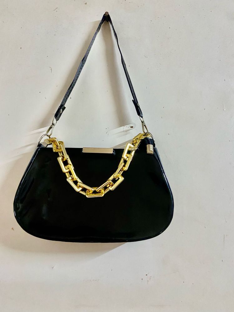 Chic Black Patent Handbag with Gold Chain