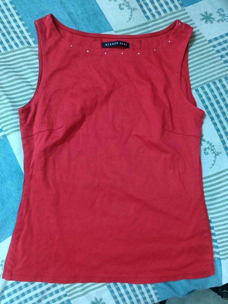 Red Sleeveless Top with Embellishments