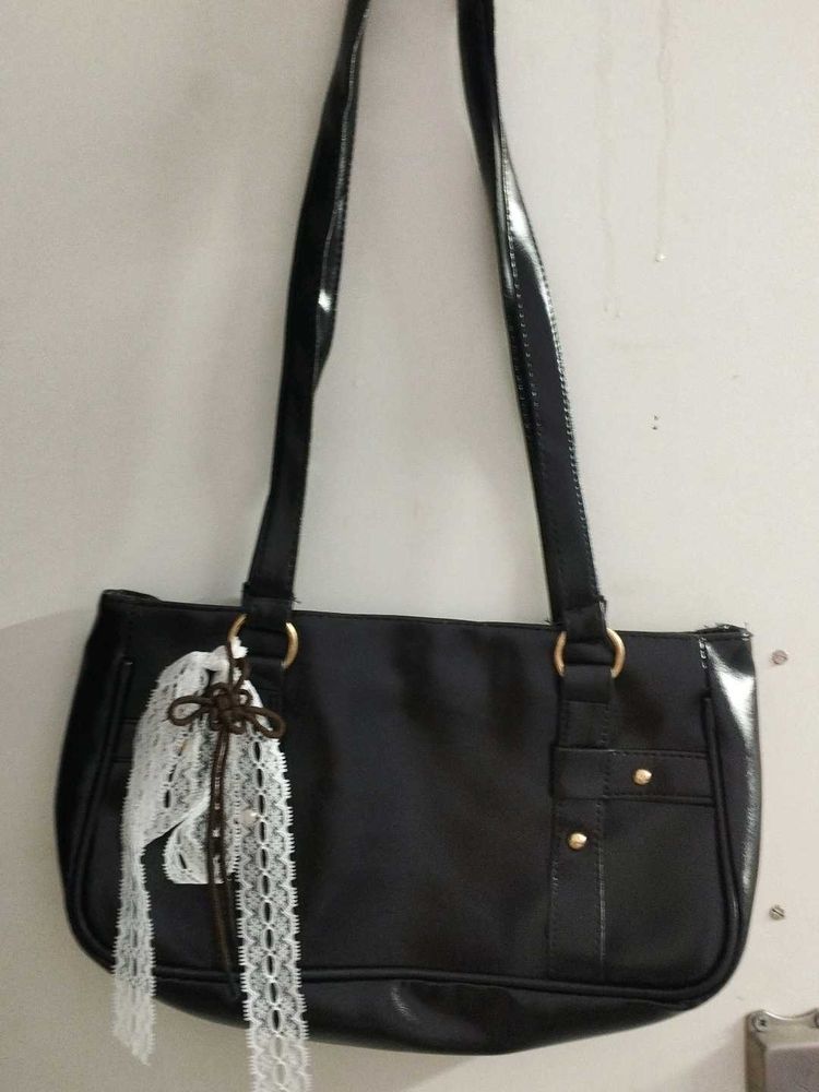 Chic Black Shoulder Bag with Lace Accent