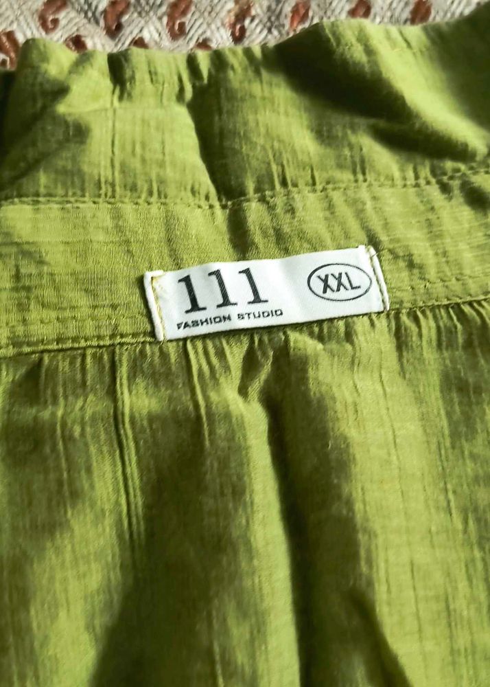 Green shirt with embroidery