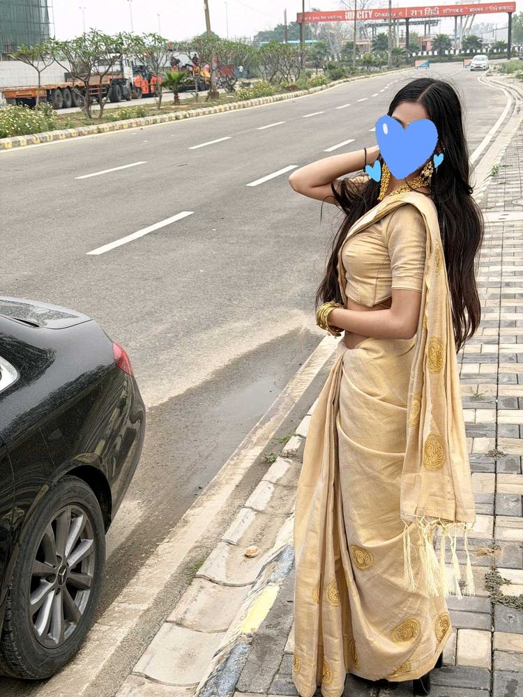 Elegant Beige Saree with Embellishments