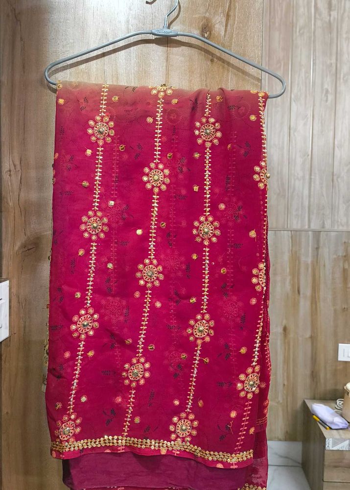 Elegant red beige Embroidered Saree