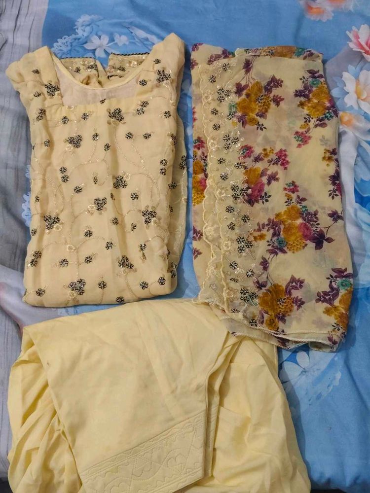 embroidered cream colour salvar suit