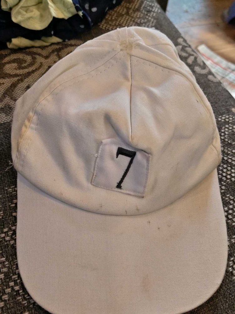 White Baseball Cap with "7" Emblem