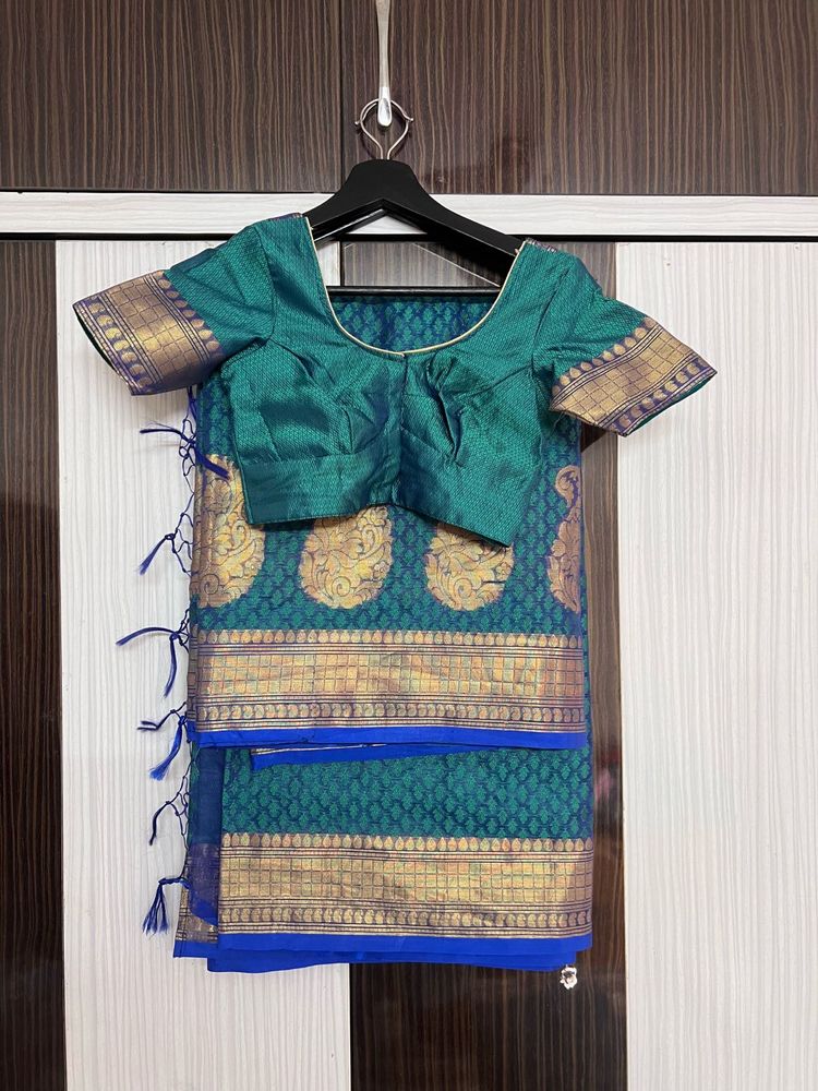 Elegant Teal Saree with Blue Border