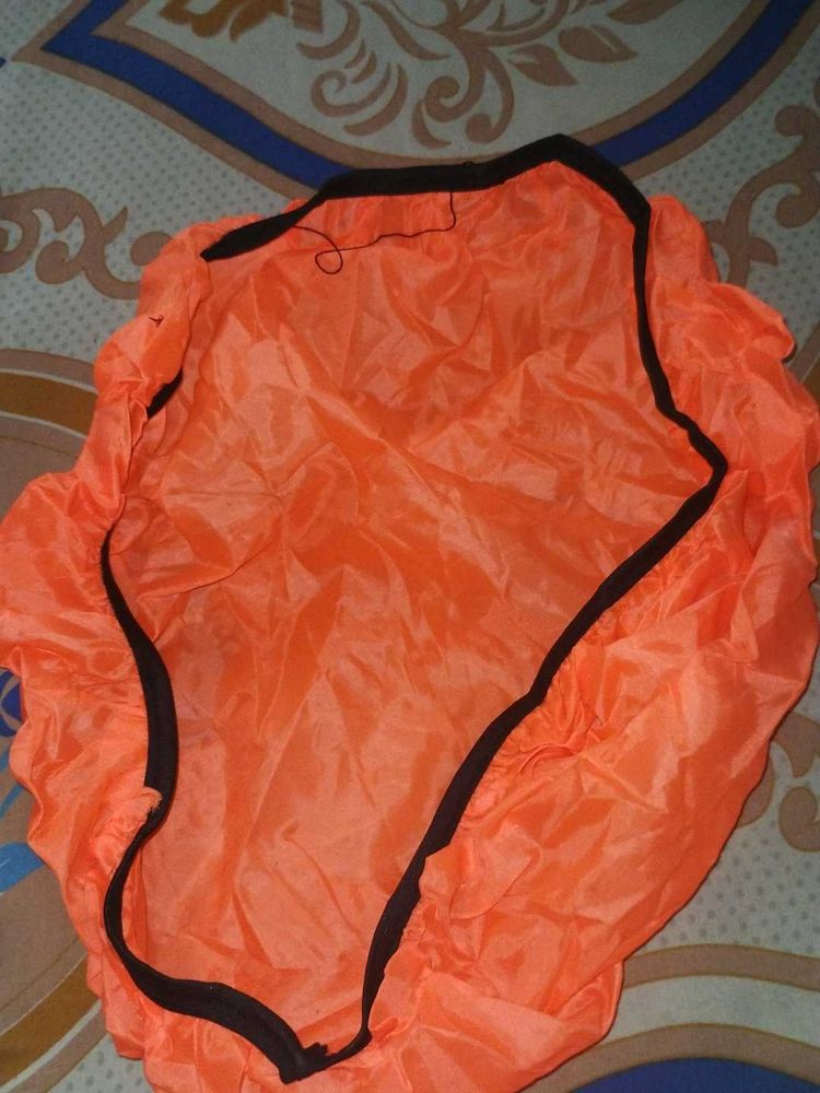 Bright Orange backpack rainy cover