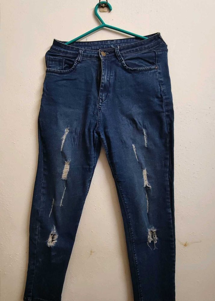 Ripped Blue Denim Jeans