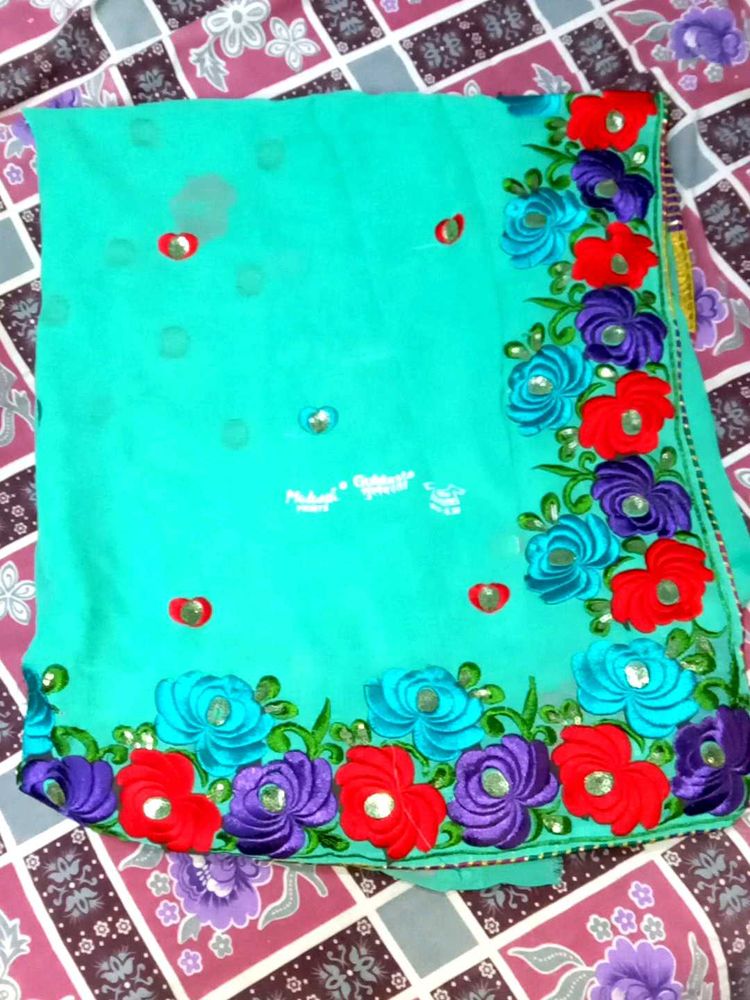 Elegant Turquoise Floral Saree