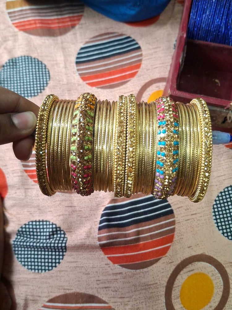 Set of Golden Bangles with Embellishments