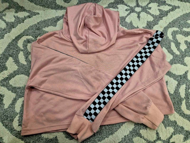 Trendy Pink Cropped Hoodie with Checkerboard Sleev