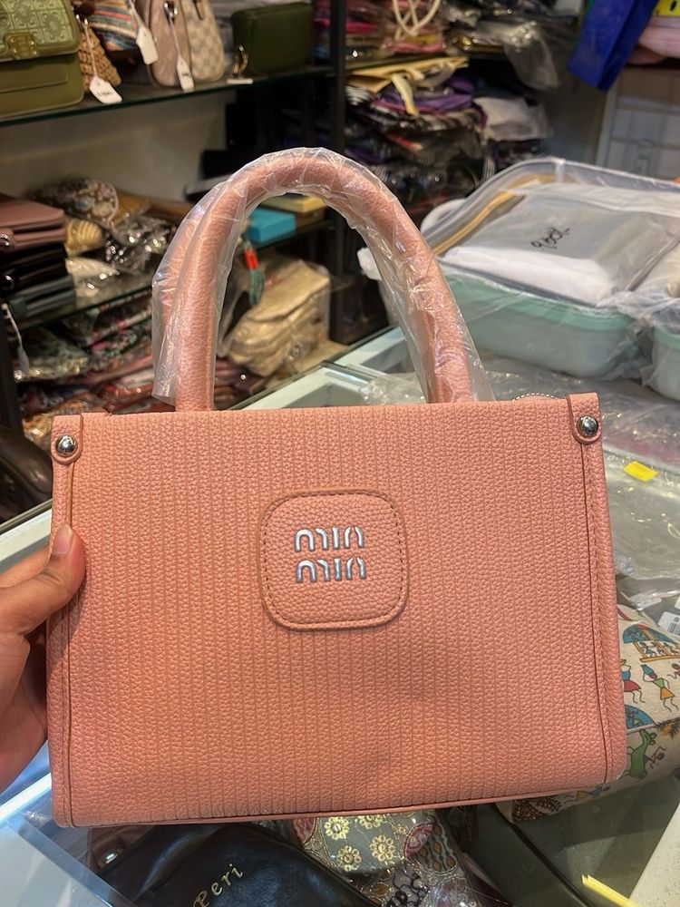 Stylish Pink Textured Handbag