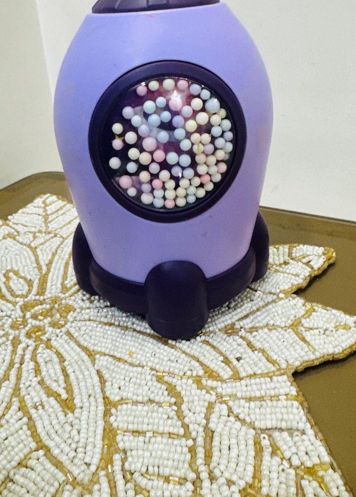 Cute Purple Rocket Piggy Bank with Colorful Balls
