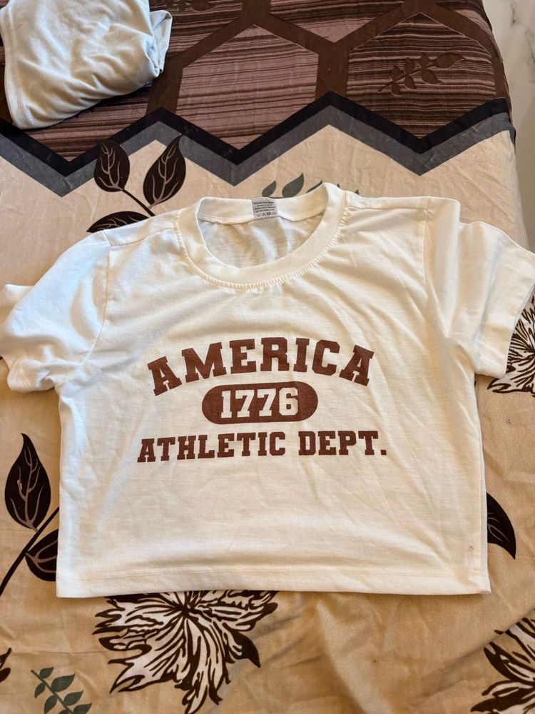 America 1776 Athletic Dept." Graphic Crop Top