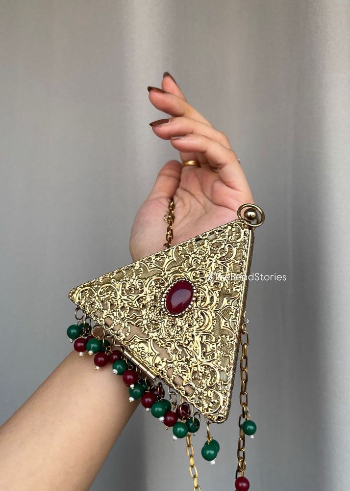 Exquisite Geometric Clutch with Gemstone