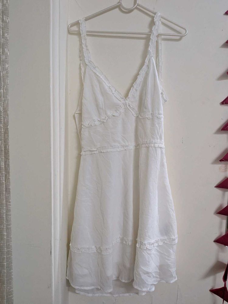 White mini tie back dress