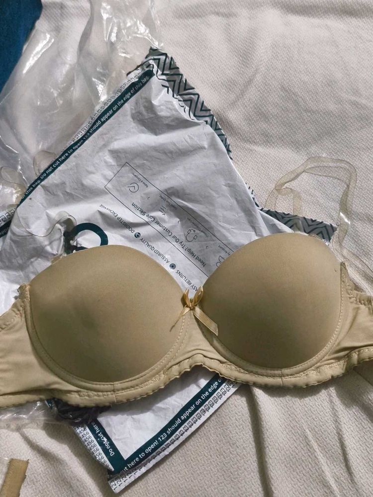 Beige padded wired bra transparent starps