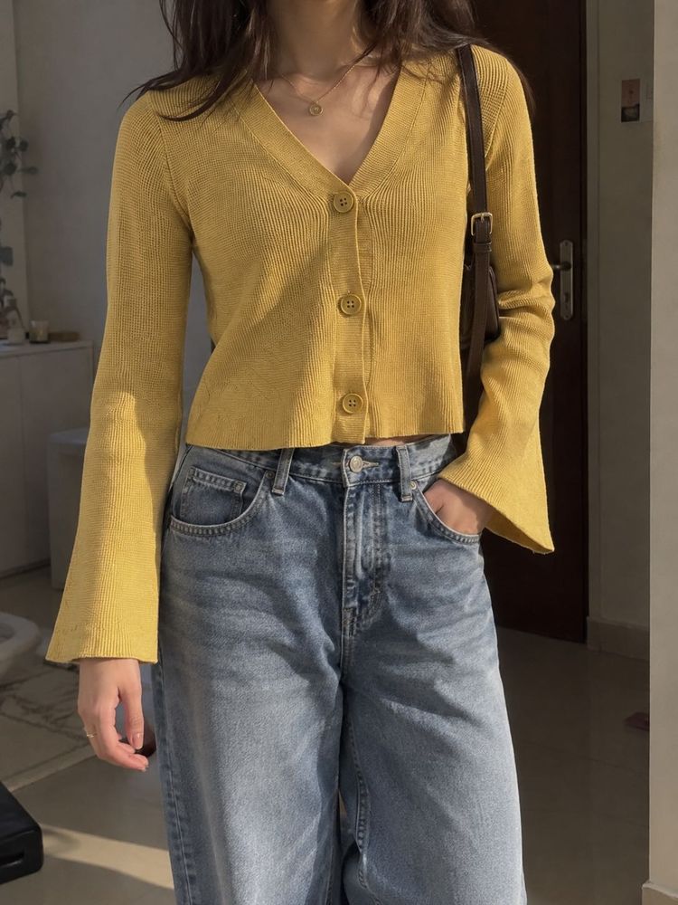 beige flared cardigan