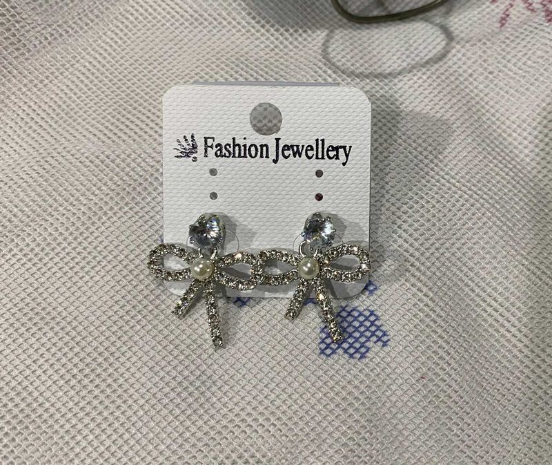 Dangling Bow Stone Earrings
