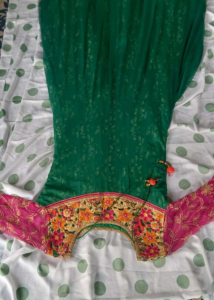 Elegant Emerald Green Saree with Floral Blouse