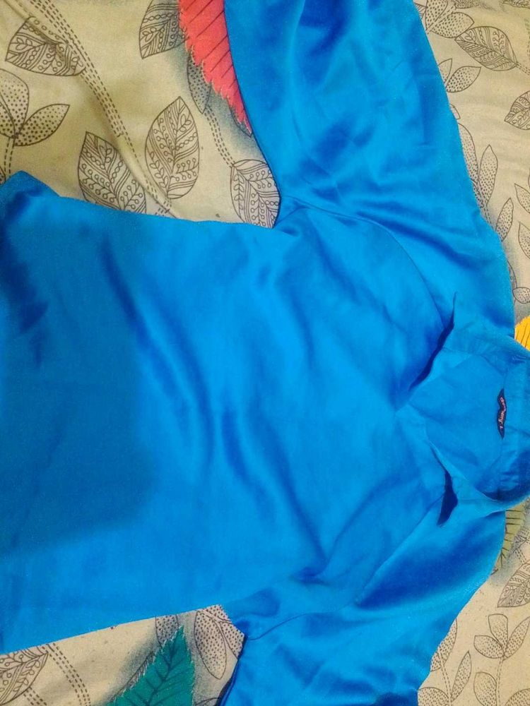 Vibrant Blue top with Pink Accents